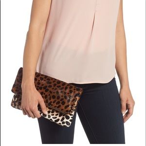 Clare Vivier leopard clutch